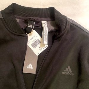 Adidas WarmUp Jacket. It SOLD on another platform.